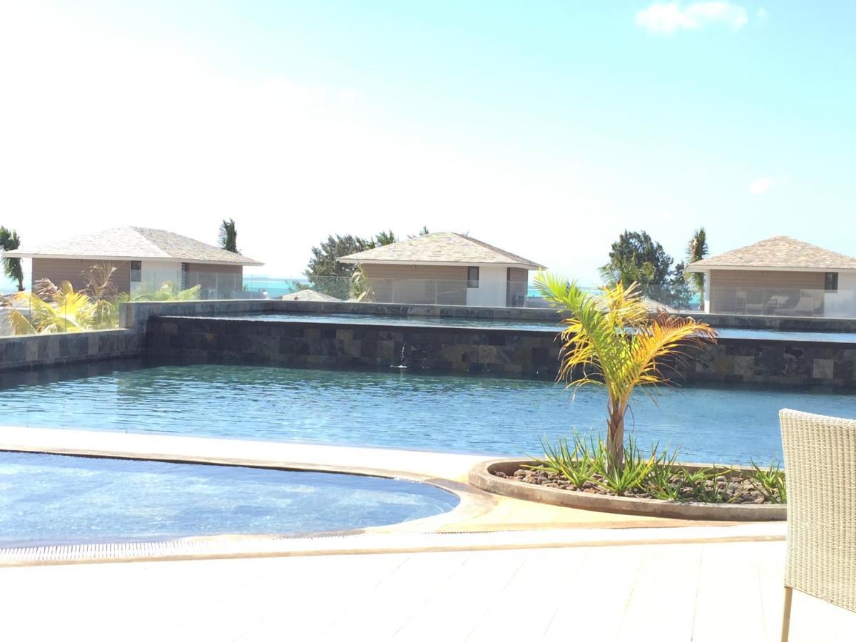 Azuri Resort -Sea View & Golf Luxury Apartment Roches Noires Bagian luar foto